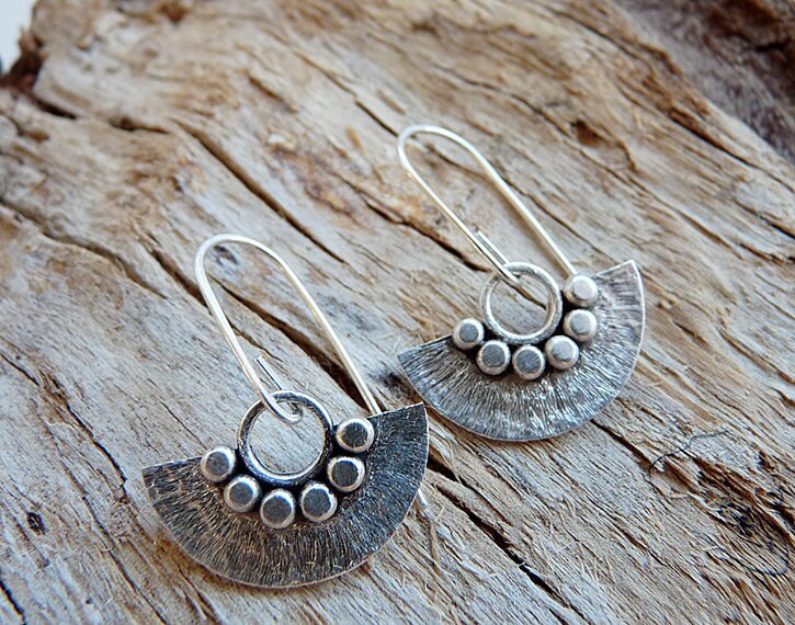 Sterling silver dangle fan earrings.