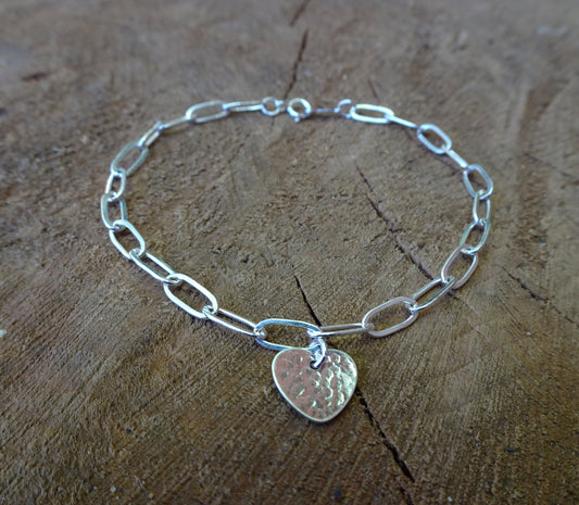 Sterling silver heart charm bracelet.