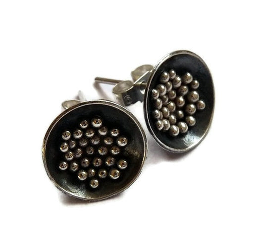 Sterling silver oxidised bowl stud earrings.