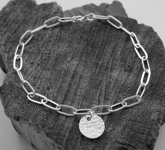 Sterling silver disc charm cable chain bracelet.