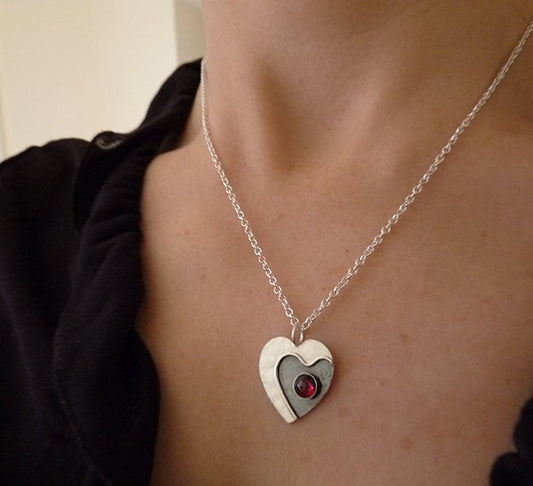 Garnet heart sterling silver necklace.