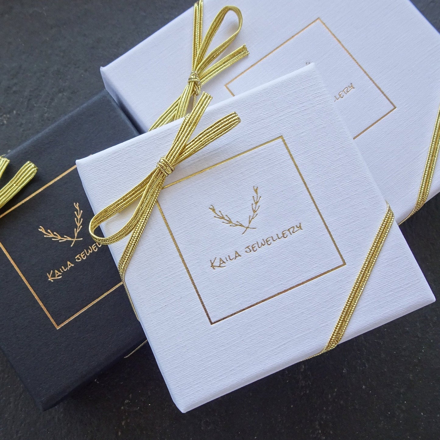 Sterling silver and 24k gold vermeil hoops.