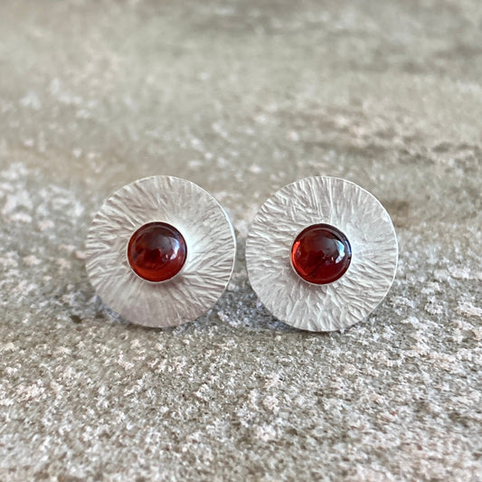 Garnet sterling silver textured stud earrings.