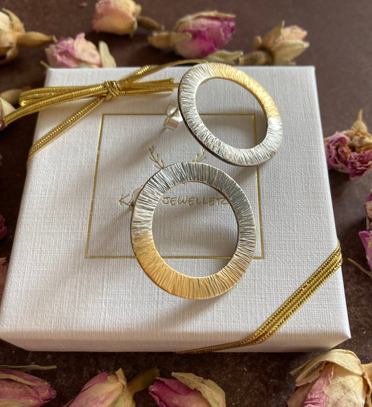 Gold plated and oxidised sterling silver circle earrings.