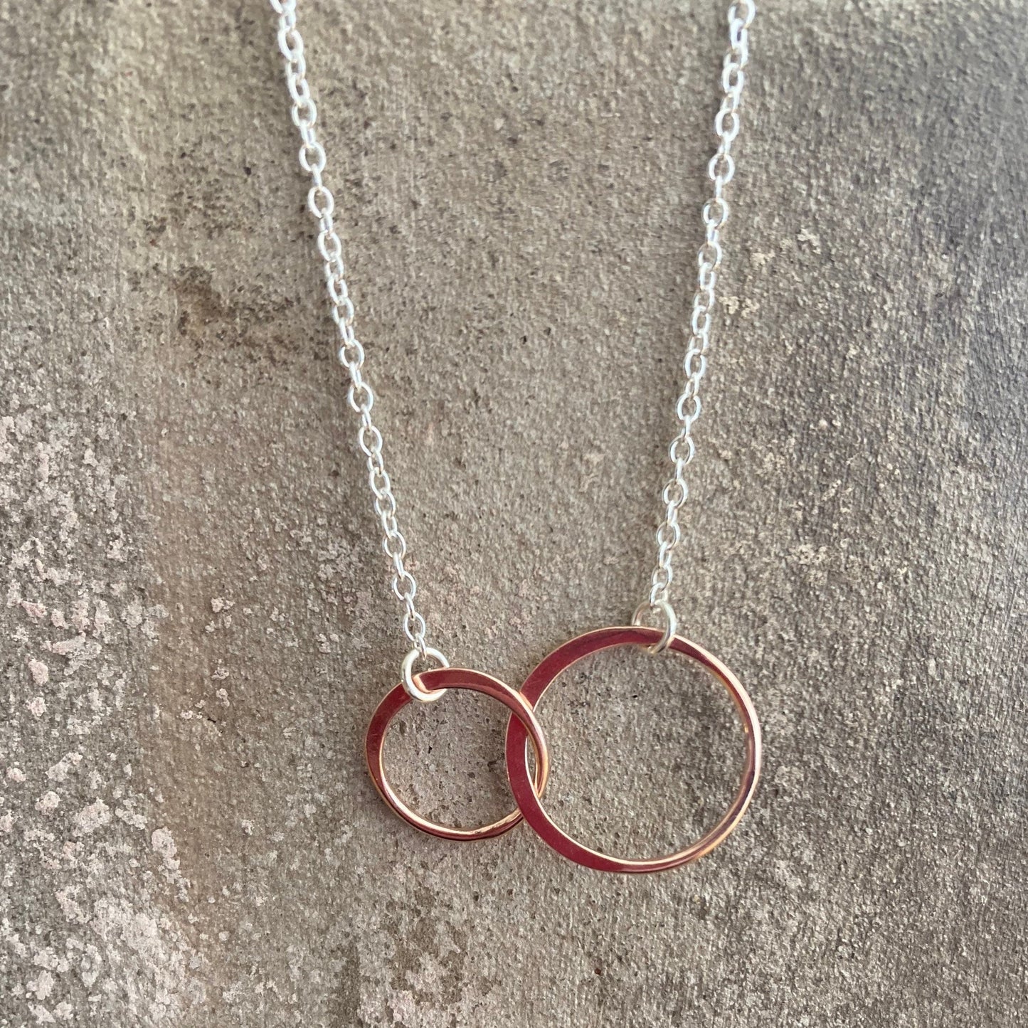 Entwined circles 18k rose gold vermeil & sterling silver necklace.