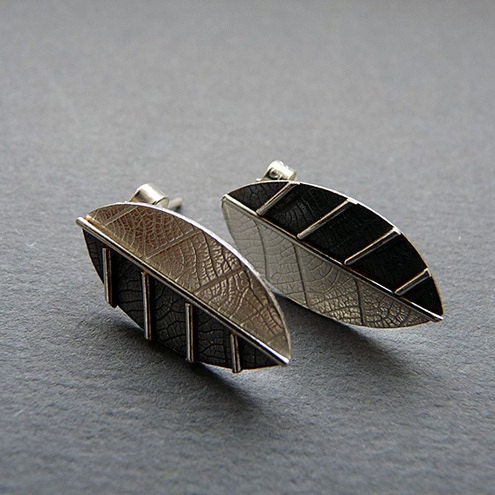 Sterling silver leaf stud earrings.