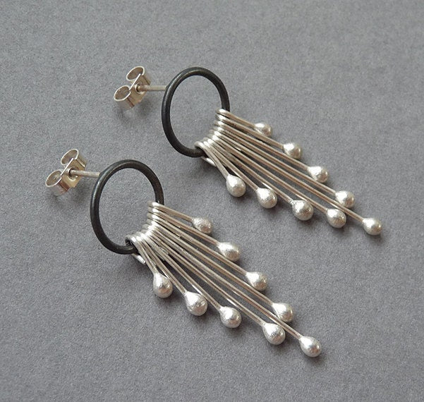 Sterling silver dangle earrings.