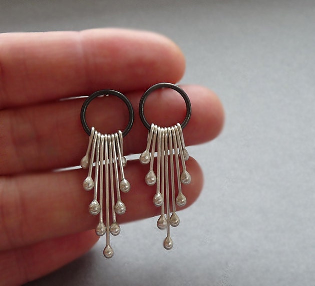 Sterling silver dangle earrings.
