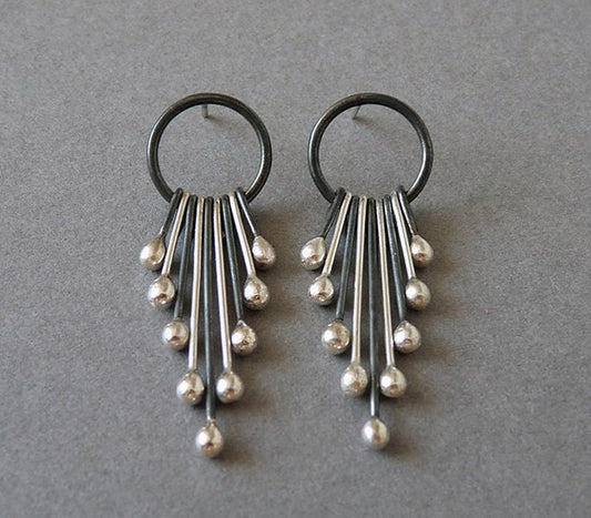 Handmade long sterling silver stud earrings.
