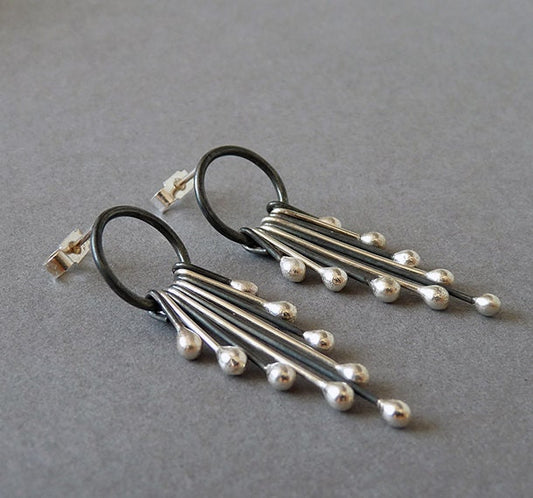 Handmade long sterling silver stud earrings.