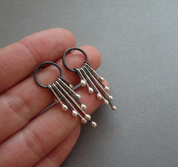 Handmade long sterling silver stud earrings.