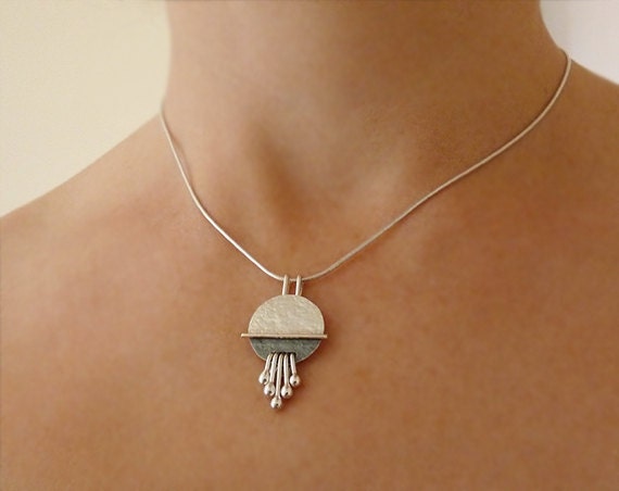 Sterling silver disc textured necklace pendant.