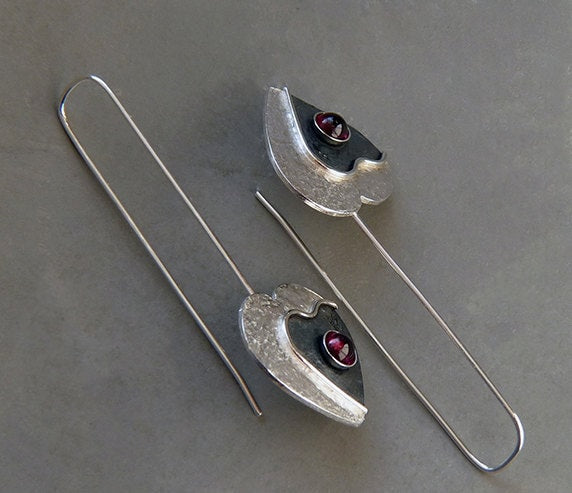 Garnet sterling silver heart earrings.