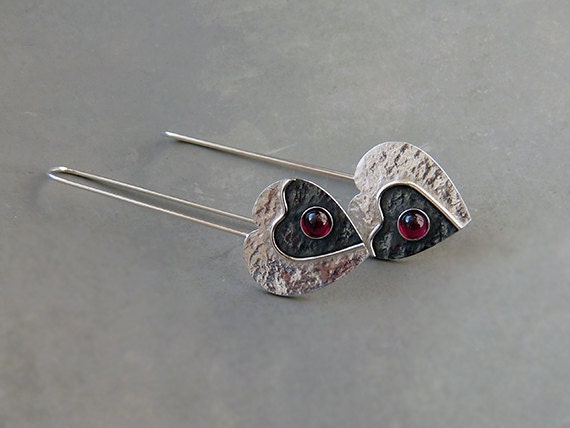 Garnet sterling silver heart earrings.
