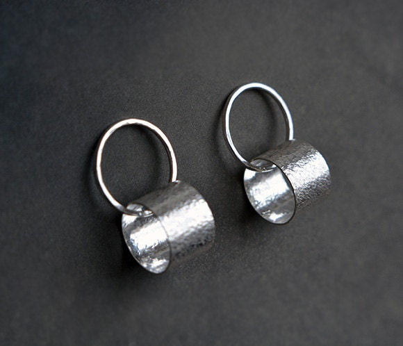 Sterling silver circle stud earrings.