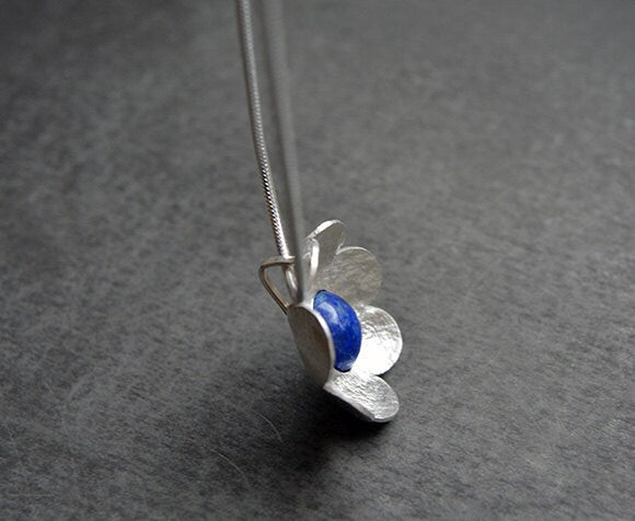Artisan lapis lazuli flower sterling silver pendant necklace.