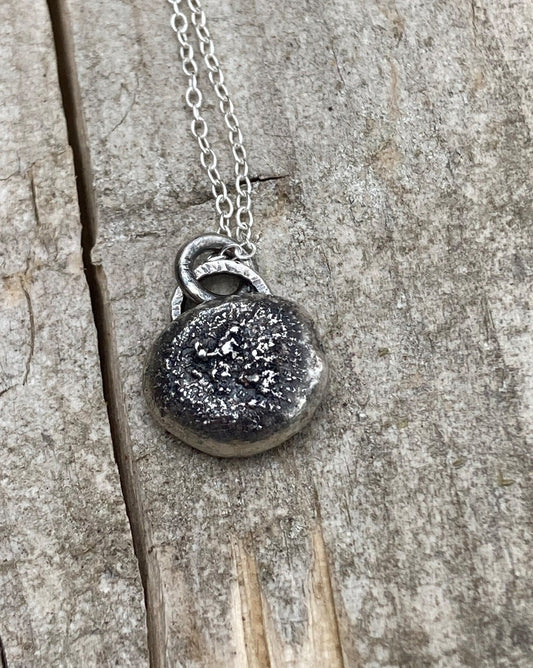 Oxidised sterling silver pebble necklace.