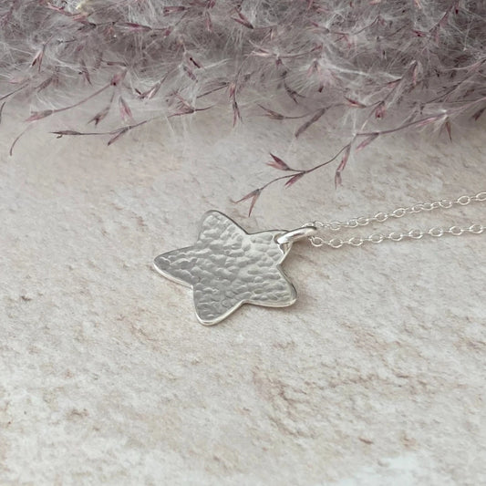 Sterling silver star necklace.