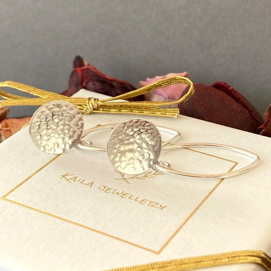 Sterling silver hammered disc earrings