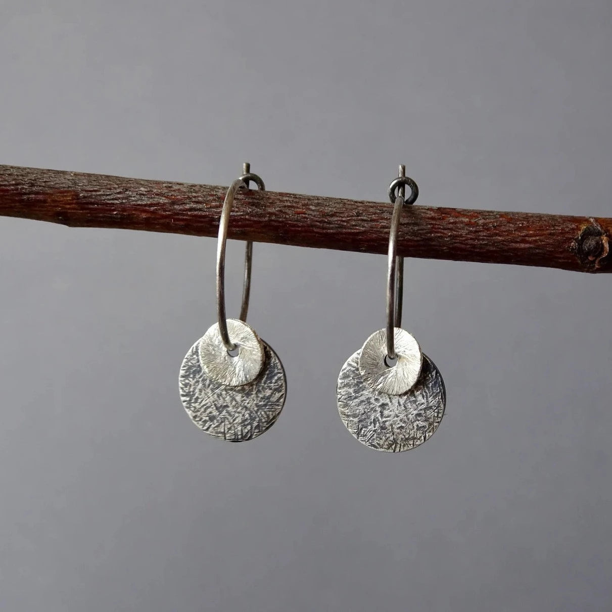 Sterling silver oxidised hammered disc hoop earrings
