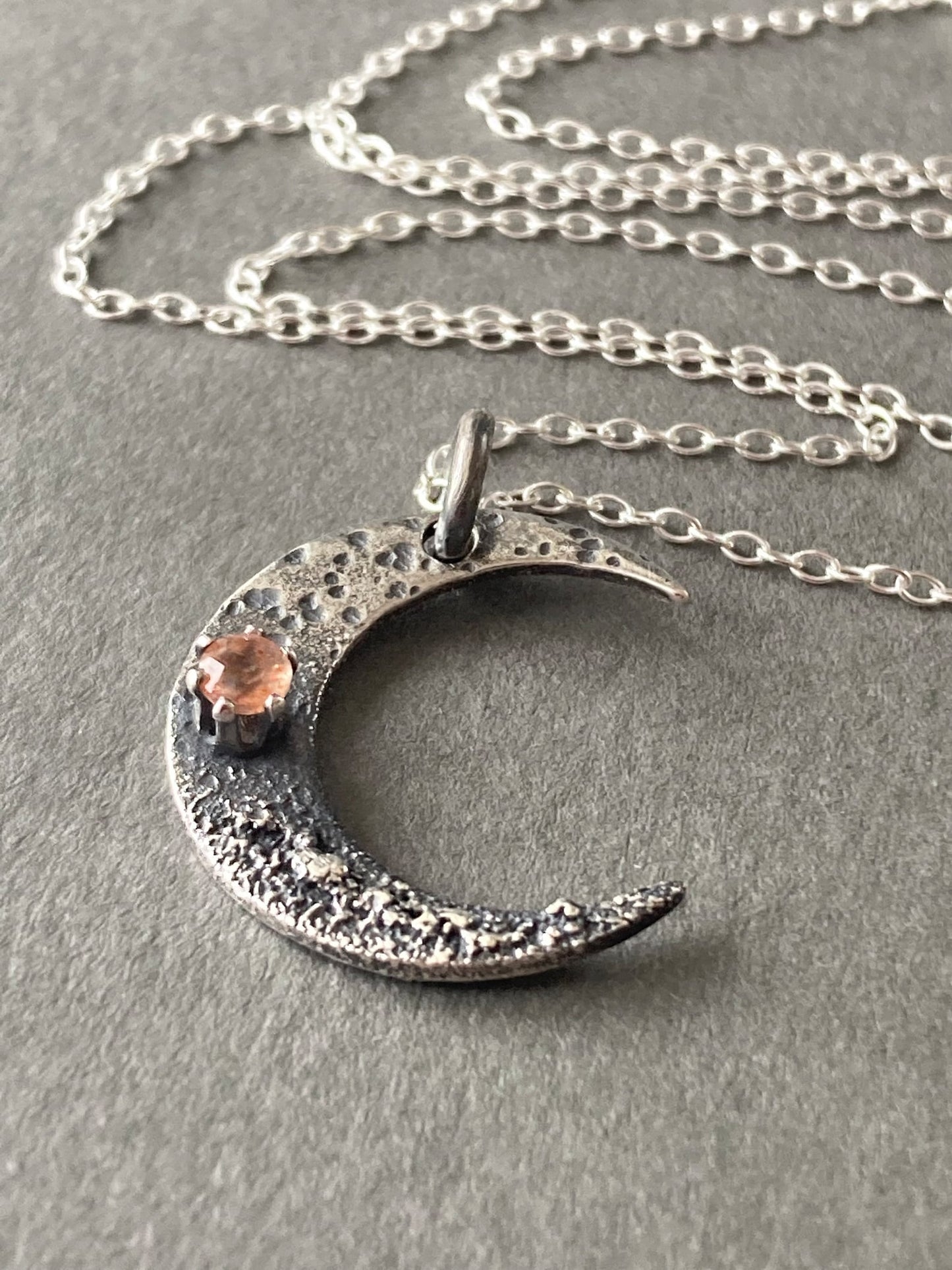 Sunstone crescent moon oxidised sterling silver necklace