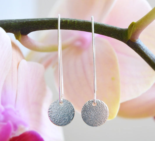 Long sterling silver hammered disc earrings