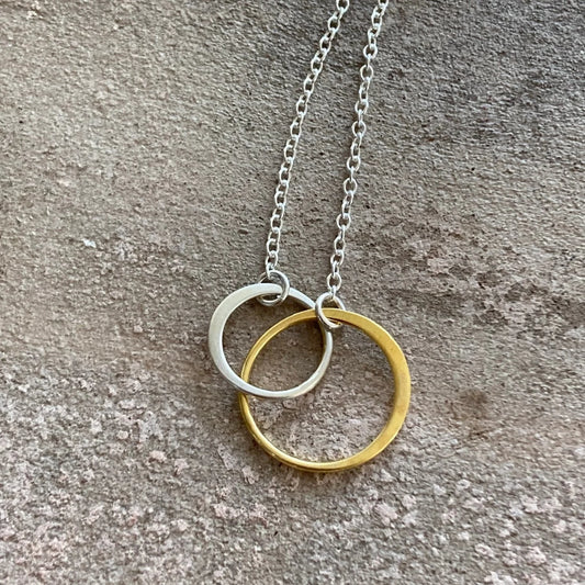 Gold vermeil and sterling silver two circles necklace.