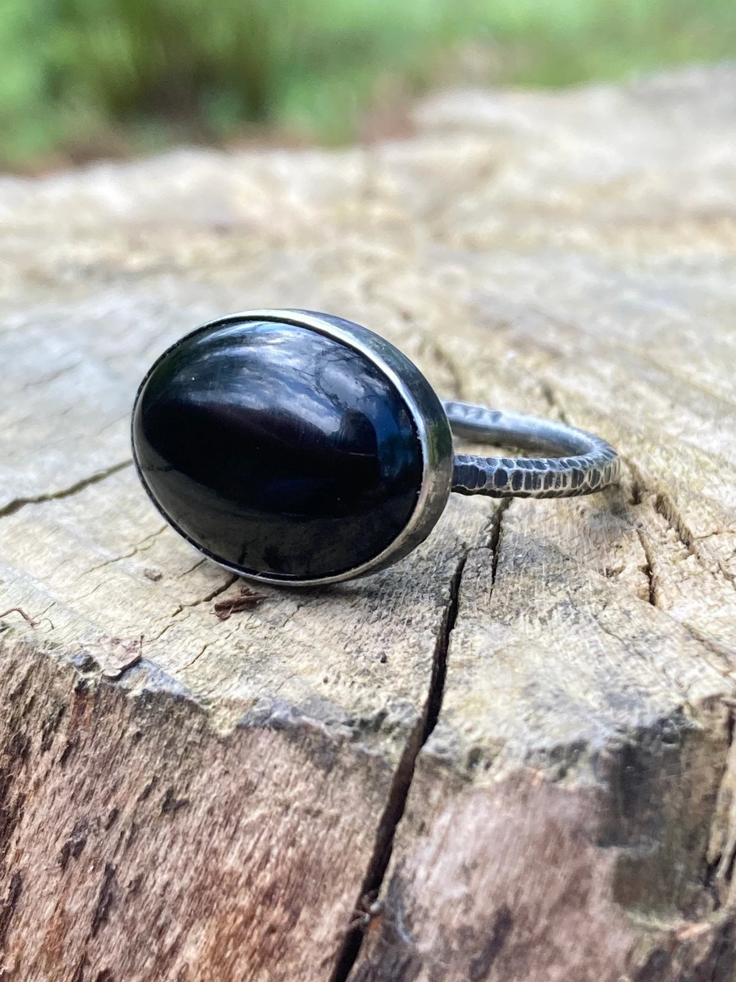 Handmade oxidised sterling silver ring with a natural black onyx