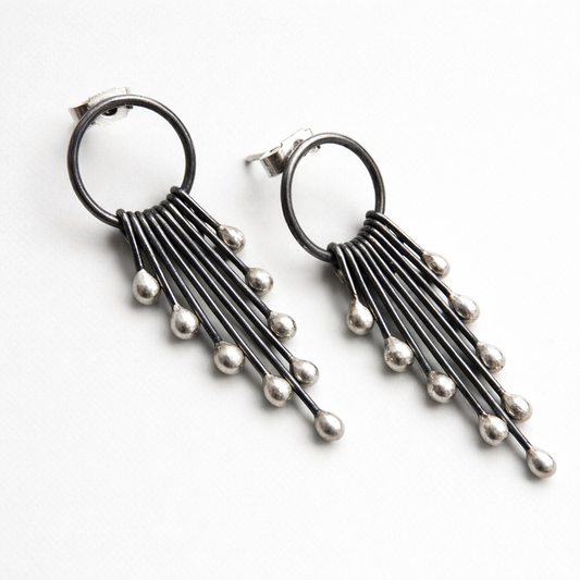 Sterling silver oxidised circle and droplets stud earrings.