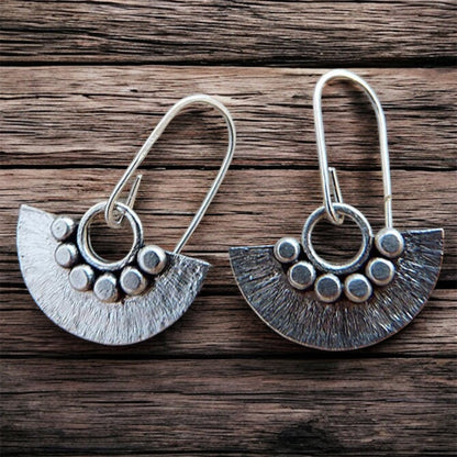 Sterling silver dangle fan earrings.
