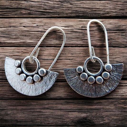 Sterling silver dangle fan earrings.