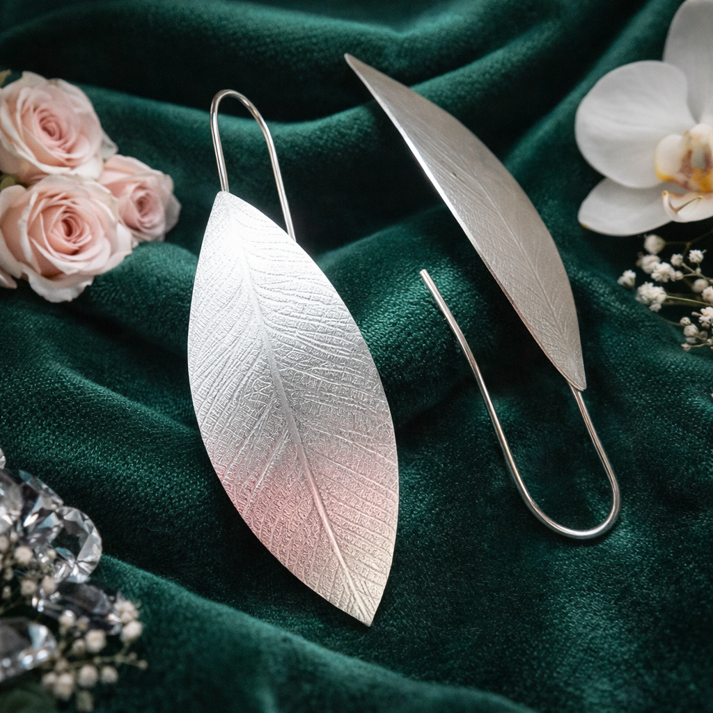 Large leaf sterling silver earrings.