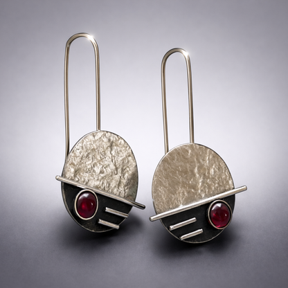 Sterling silver garnet earrings.