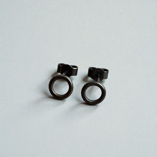 Oxidised sterling silver circle stud earrings.
