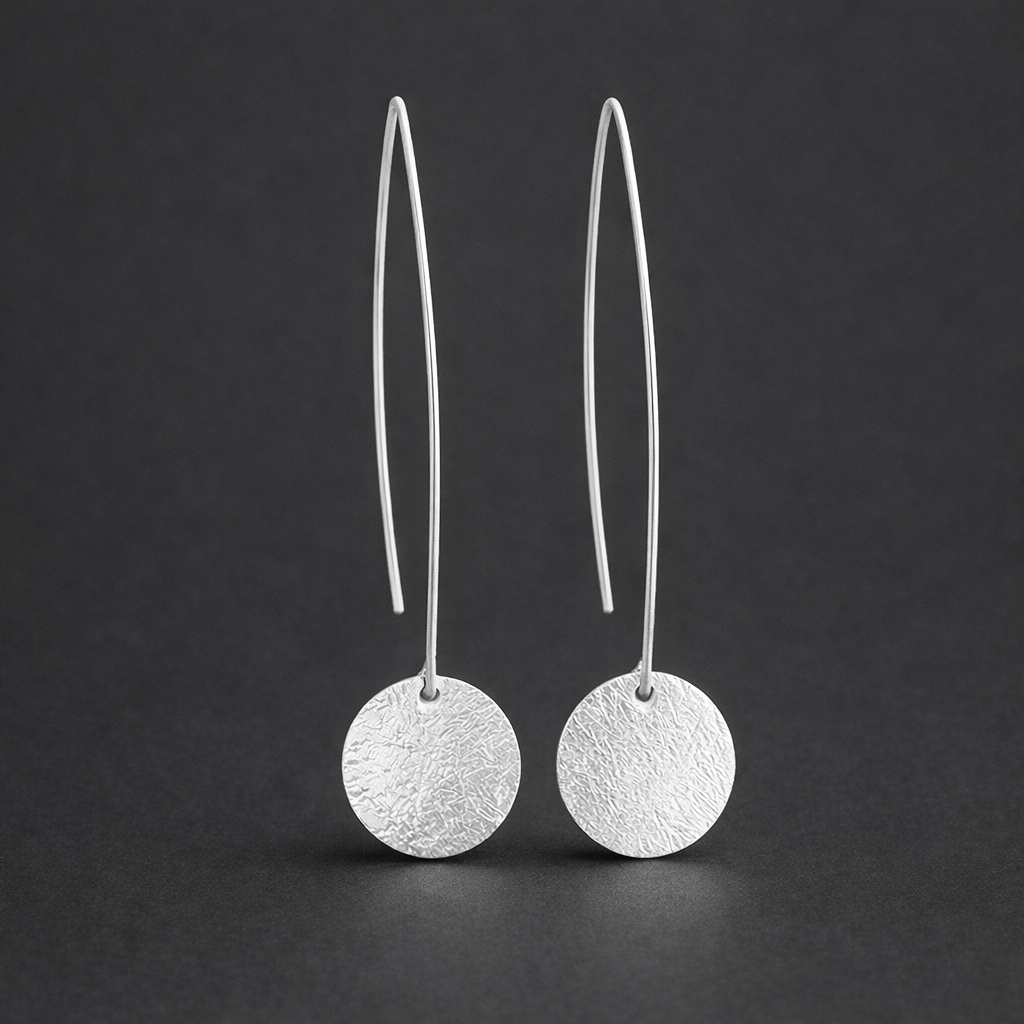 Long sterling silver hammered disc earrings
