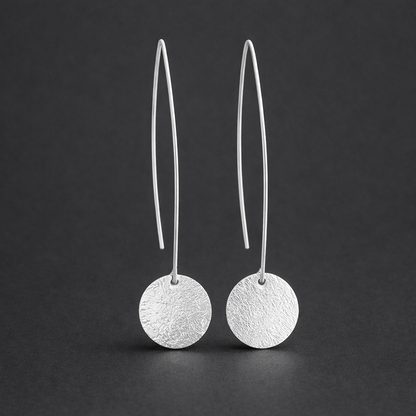 Long sterling silver hammered disc earrings