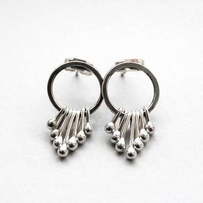 Sterling silver oxidised circle dangle studs.