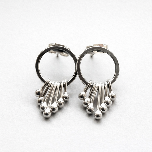 Sterling silver oxidised circle dangle studs.