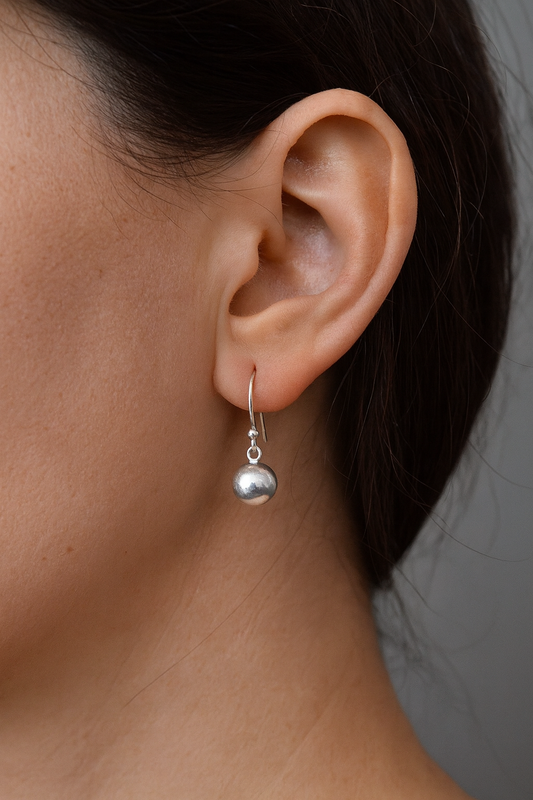 Ball sterling silver dangle earrings.