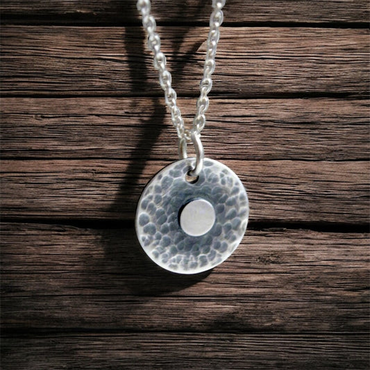Hammered disc, sterling silver necklace.