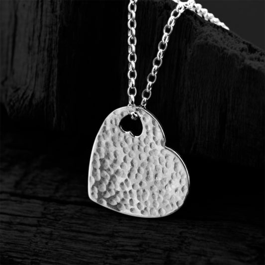 Hammered sterling silver heart necklace pendant.