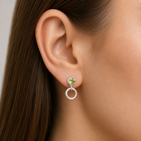 Peridot and circle sterling silver stud earrings.