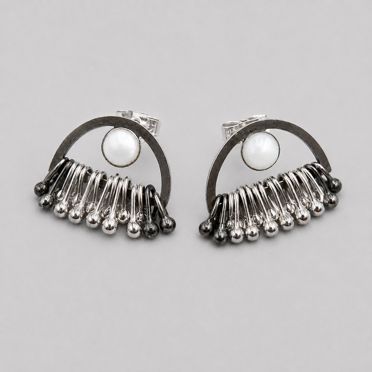 Mother of Pearl sterling silver dangle stud earrings.