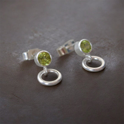 Peridot and circle sterling silver stud earrings.