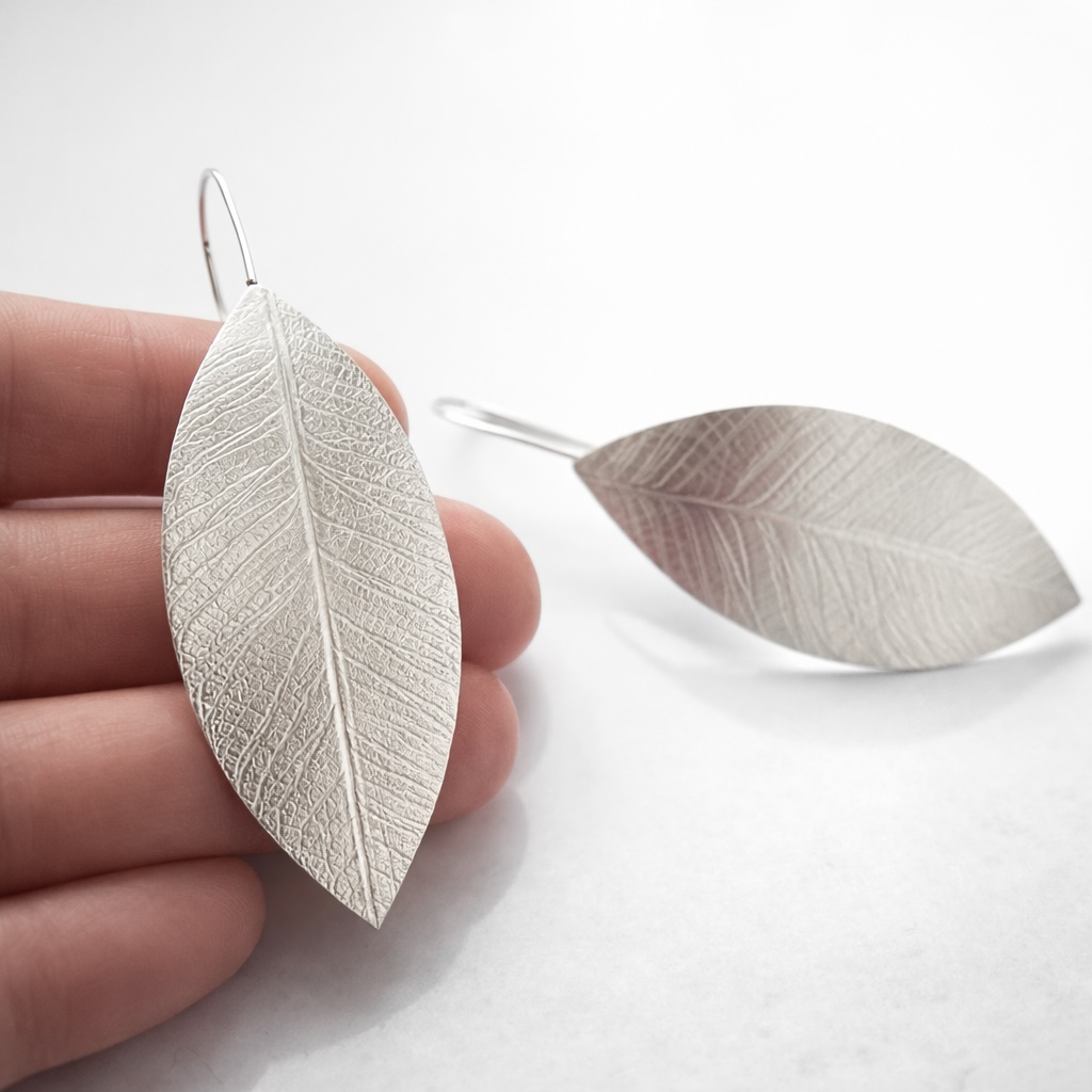 Large leaf sterling silver earrings.