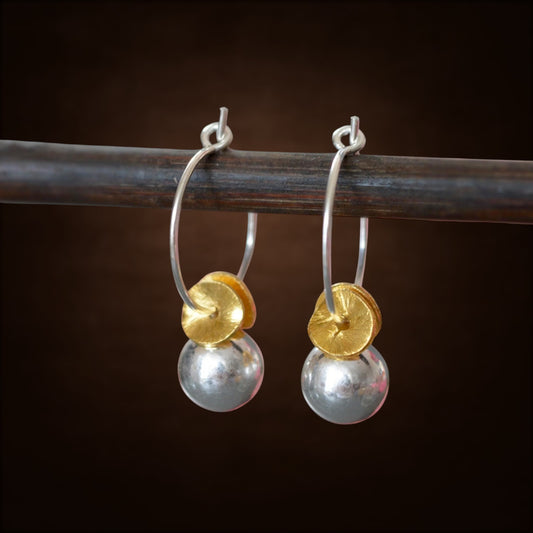 Sterling silver ball hoop earrings.