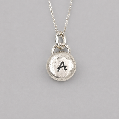 Pebble solid sterling silver personalised letter necklace.