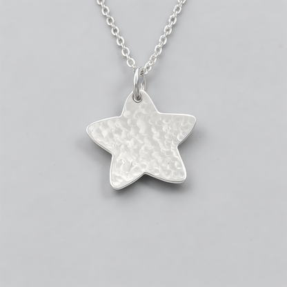 Sterling silver star necklace.