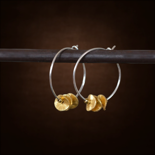 Sterling silver and 24k gold vermeil hoops.