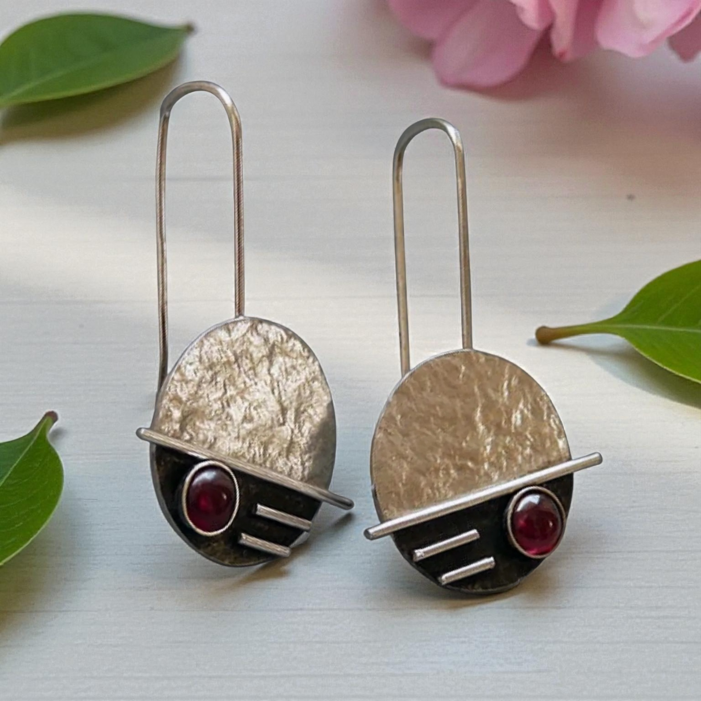 Sterling silver garnet earrings.